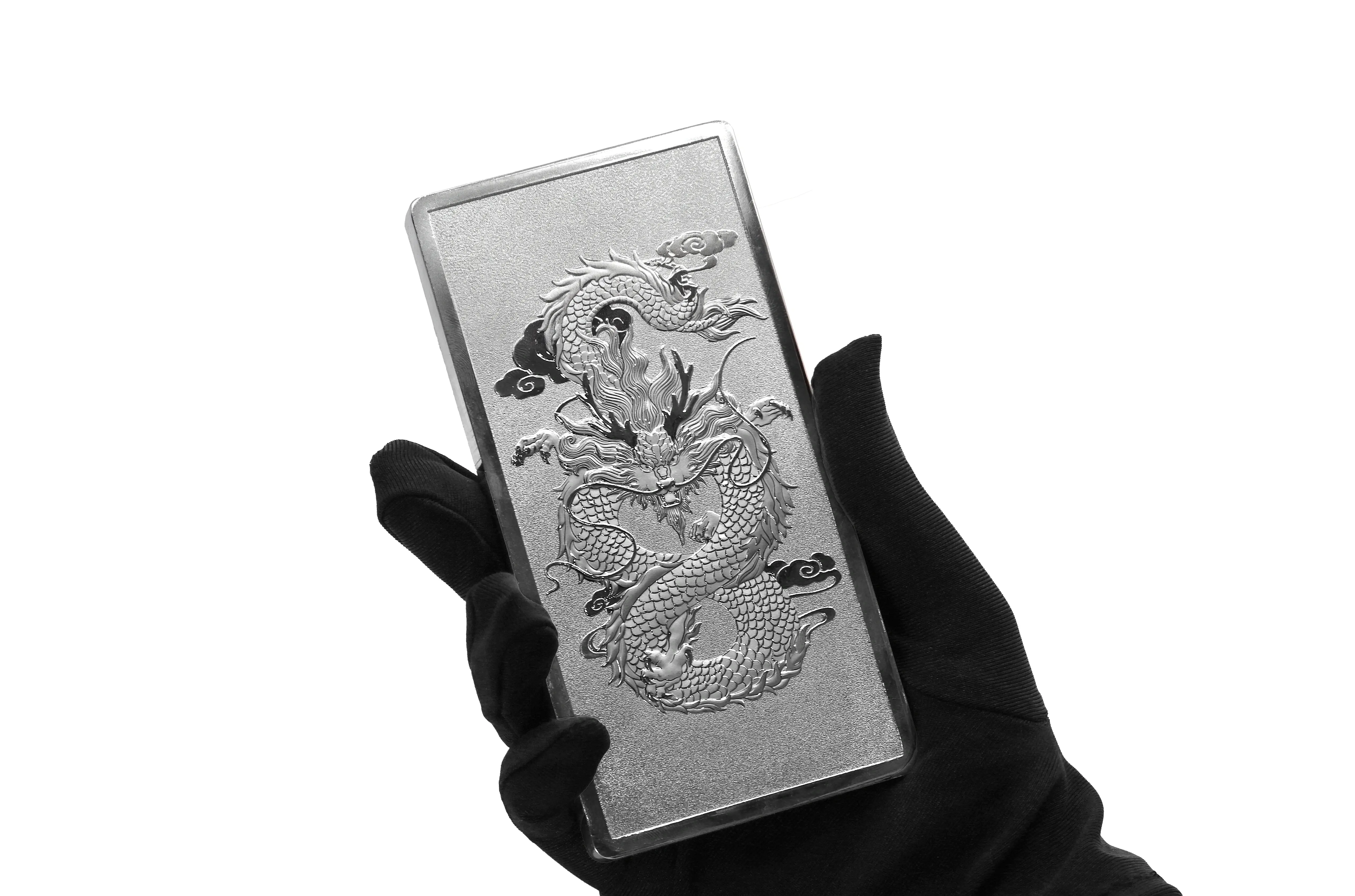 Cận cảnh thiết kế Rồng tinh xảo trên thỏi bạc Ngân Long Quảng Tiến 1KG - Biểu tượng của quyền lực và sự thăng hoa Cận cảnh thiết kế Rồng tinh xảo trên thỏi bạc Ngân Long Quảng Tiến 1KG - Biểu tượng của quyền lực và sự thăng hoa